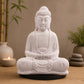 Lampe Bouddha lavande craquelée éteinte sur socle ovale noir en décor naturel.