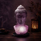 Lampe buste de Bouddha lavande craquelée allumée dans une ambiance zen aux encens