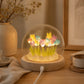 Lampe dôme aux 20 tulipes multicolores LED allumée dans une ambiance.