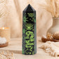 Pointe d'obsidienne noire gravée d'un serpent et d'un œil mystique en vert